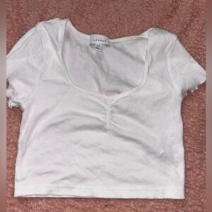 White ruffled sleeve top